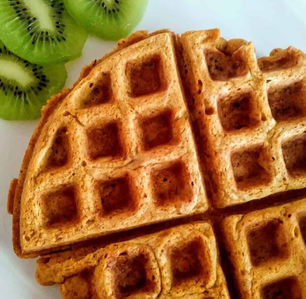 pumpkin spice waffle with 3 slices of kiwi